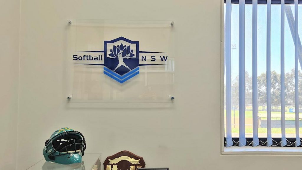 Mounted Clear acrylic signage with Softball NSW logo